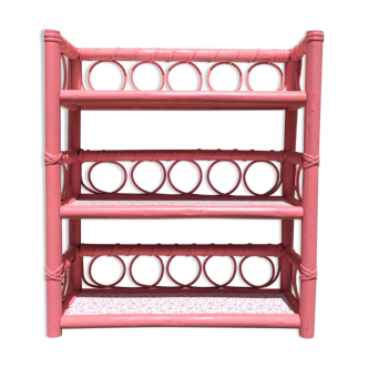 Pink rattan shelf