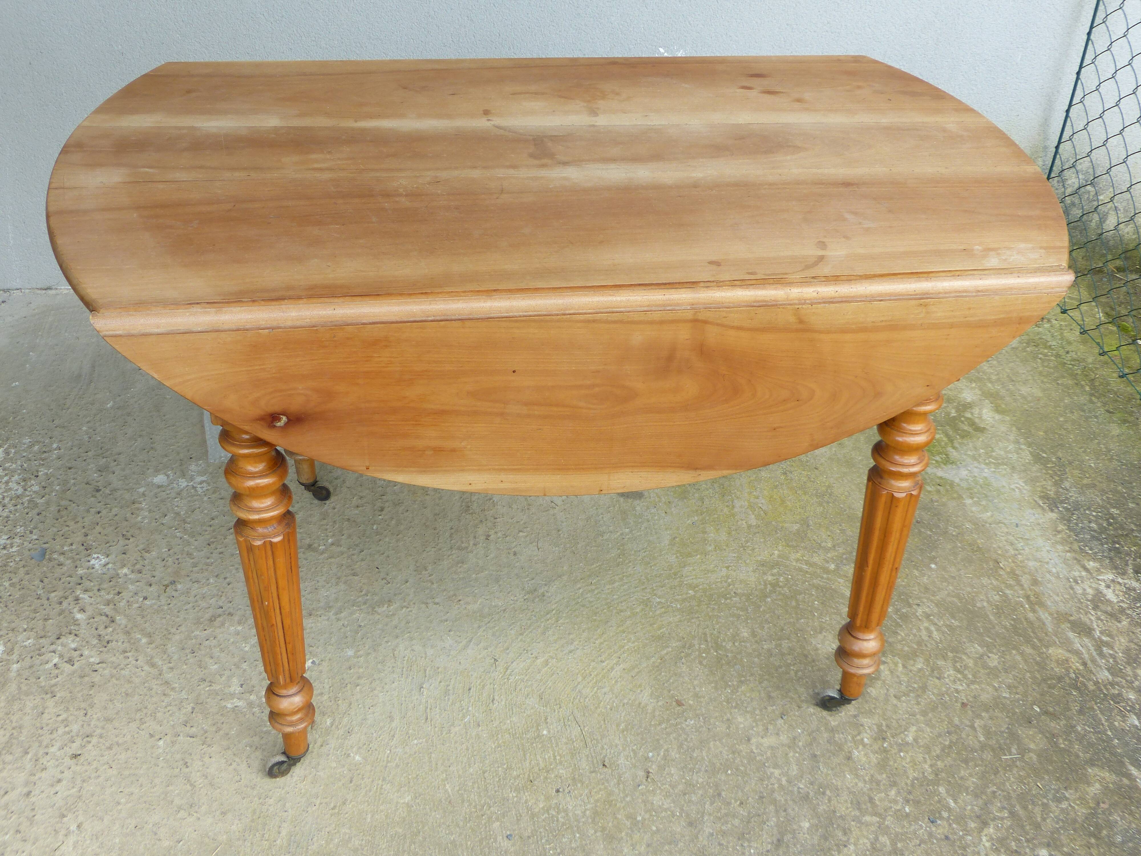 Cherry wood shuttered table.