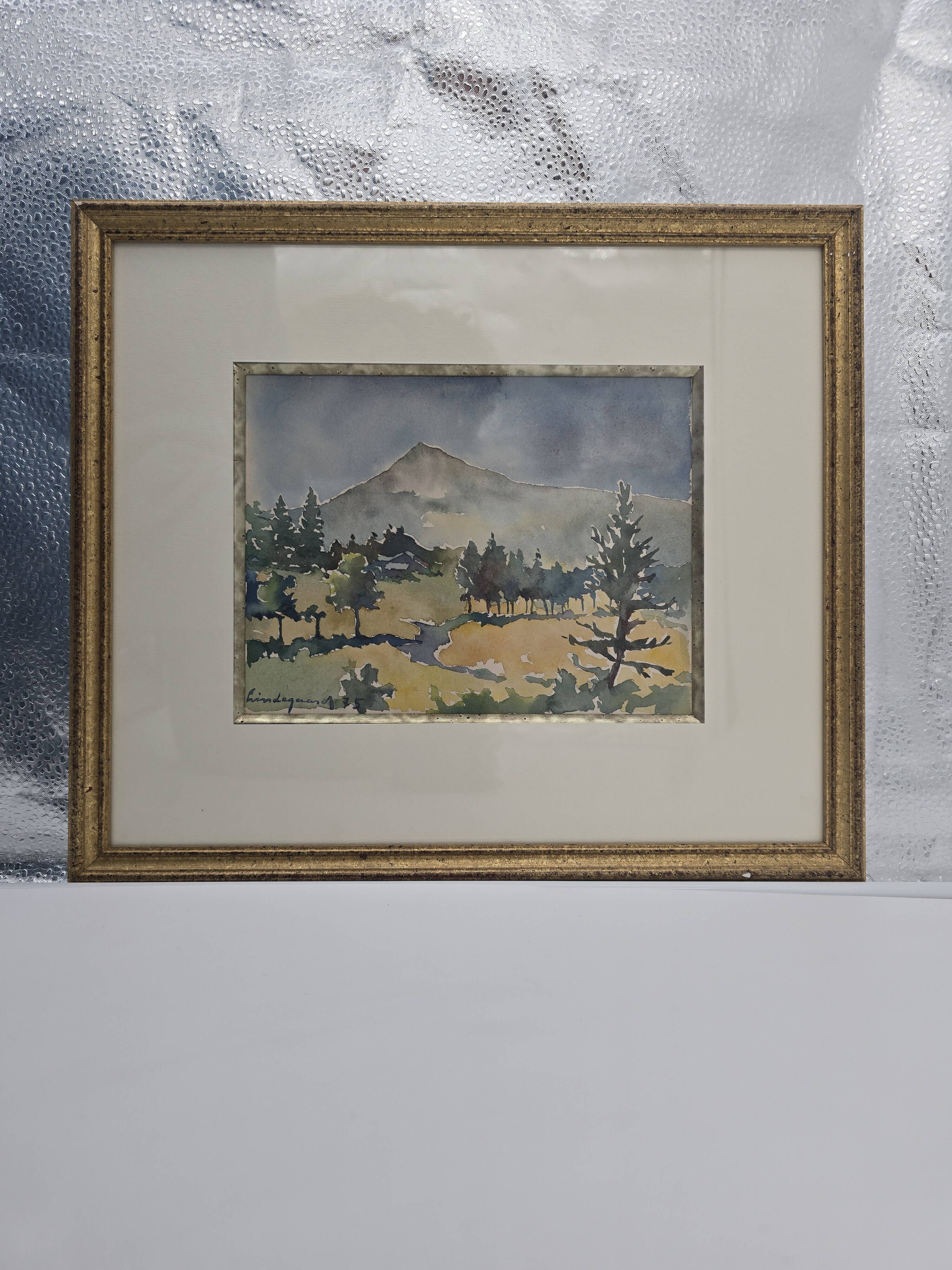 Framed watercolor by Henri Lindegaard 1975 - Forest and mountain landscape