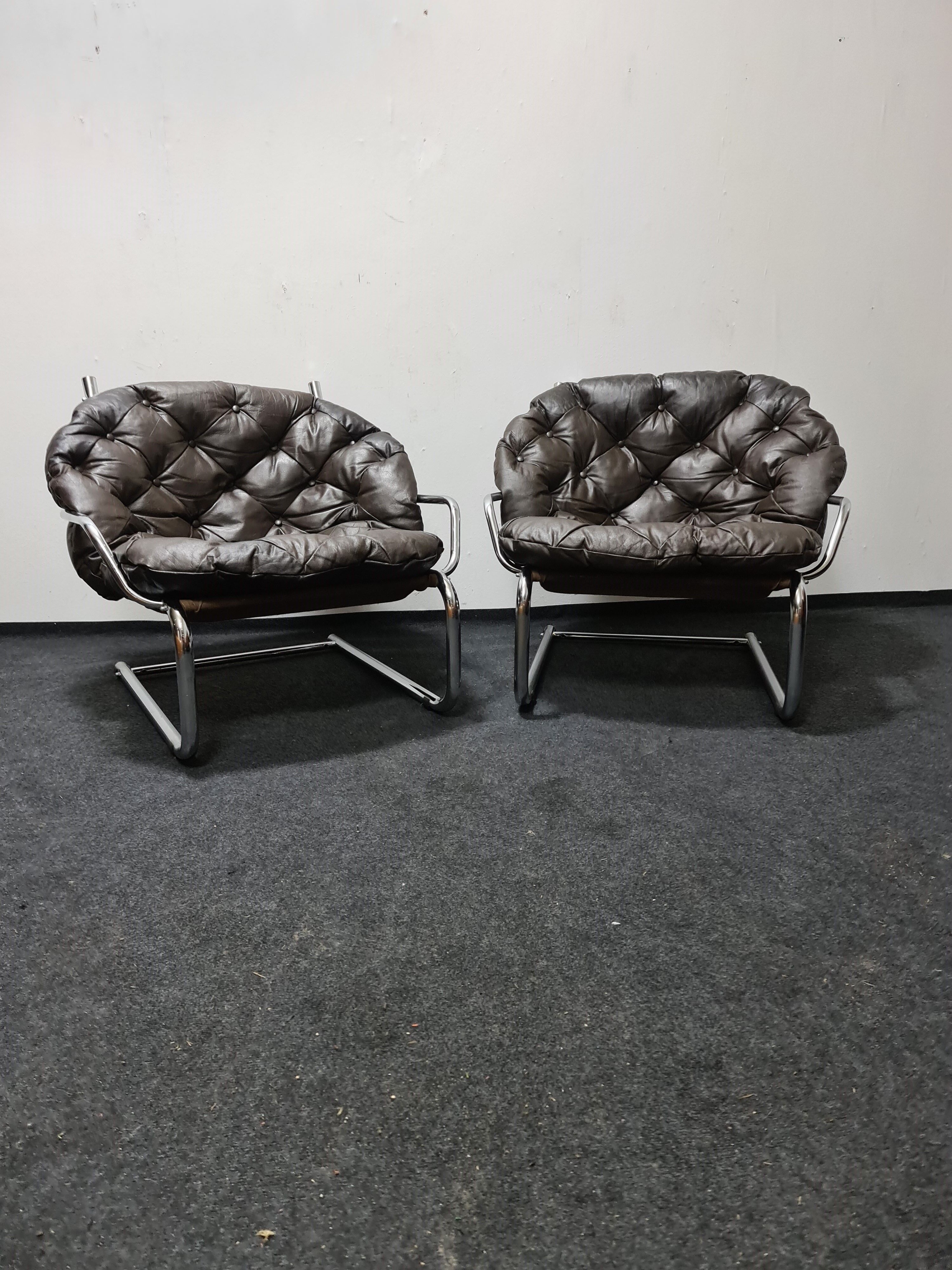 Pair of chrome and leather vintage chairs