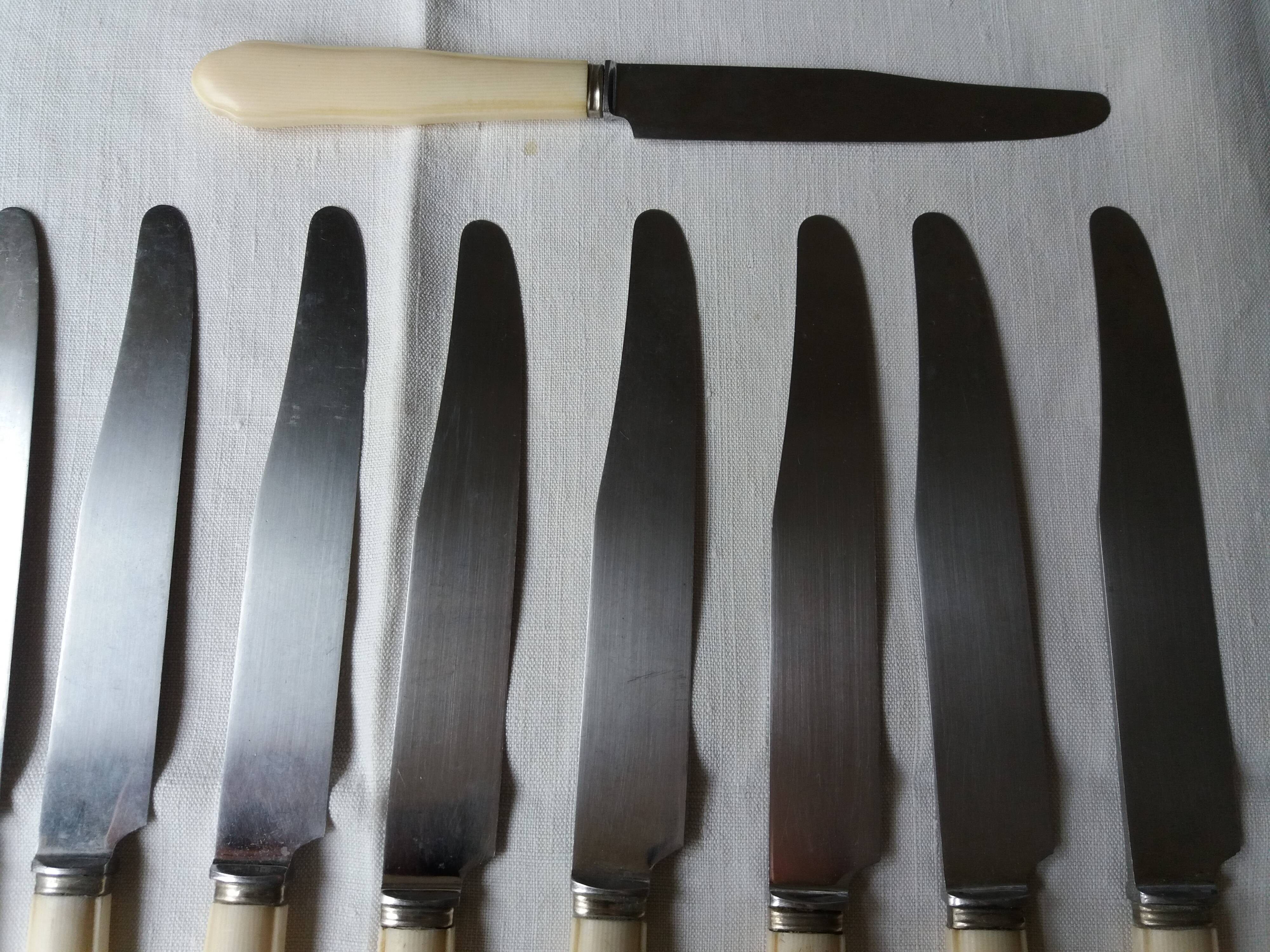 Set of twelve art deco knives with ivory handle