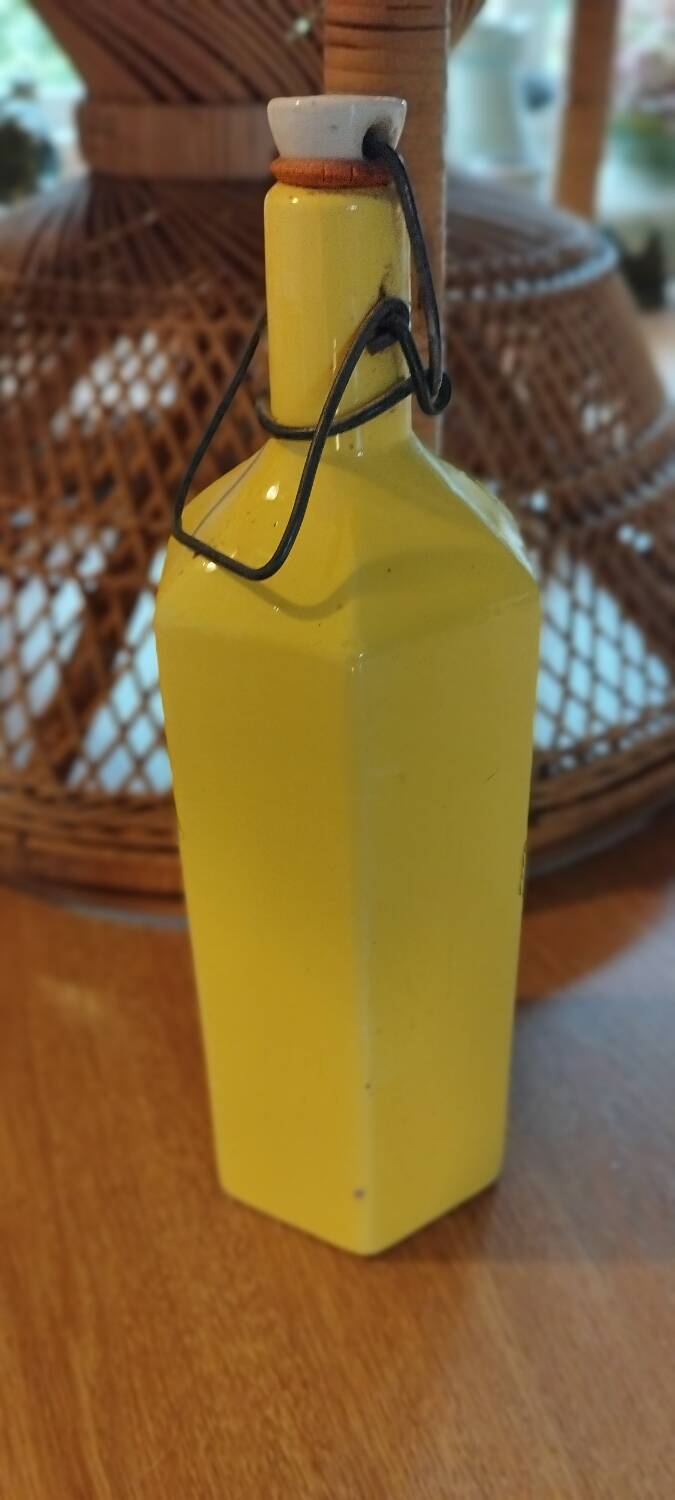 Glazed yellow stoneware bottle, 20th century.