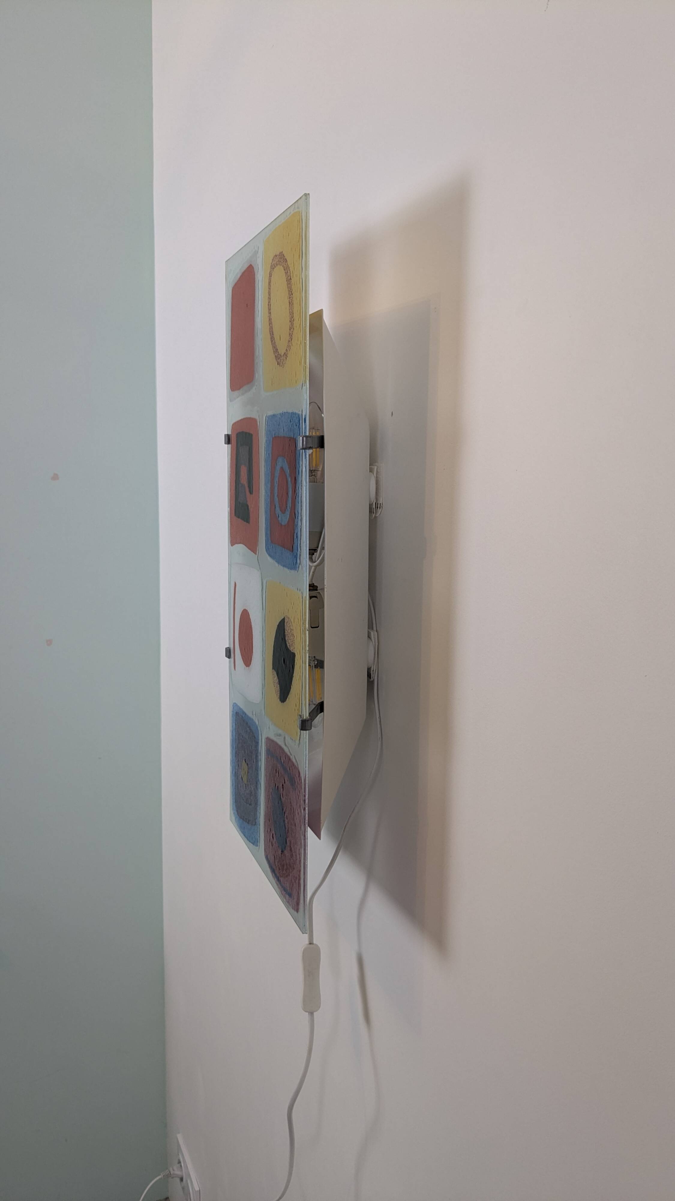 IKEA Gyllen wall lamp in decorated glass, Scandinavian design.
