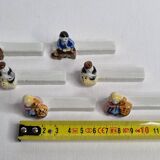 Six Le Merzer porcelain knife holders, 6 cm