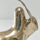 Two stylized zebu with long vintage brass horns