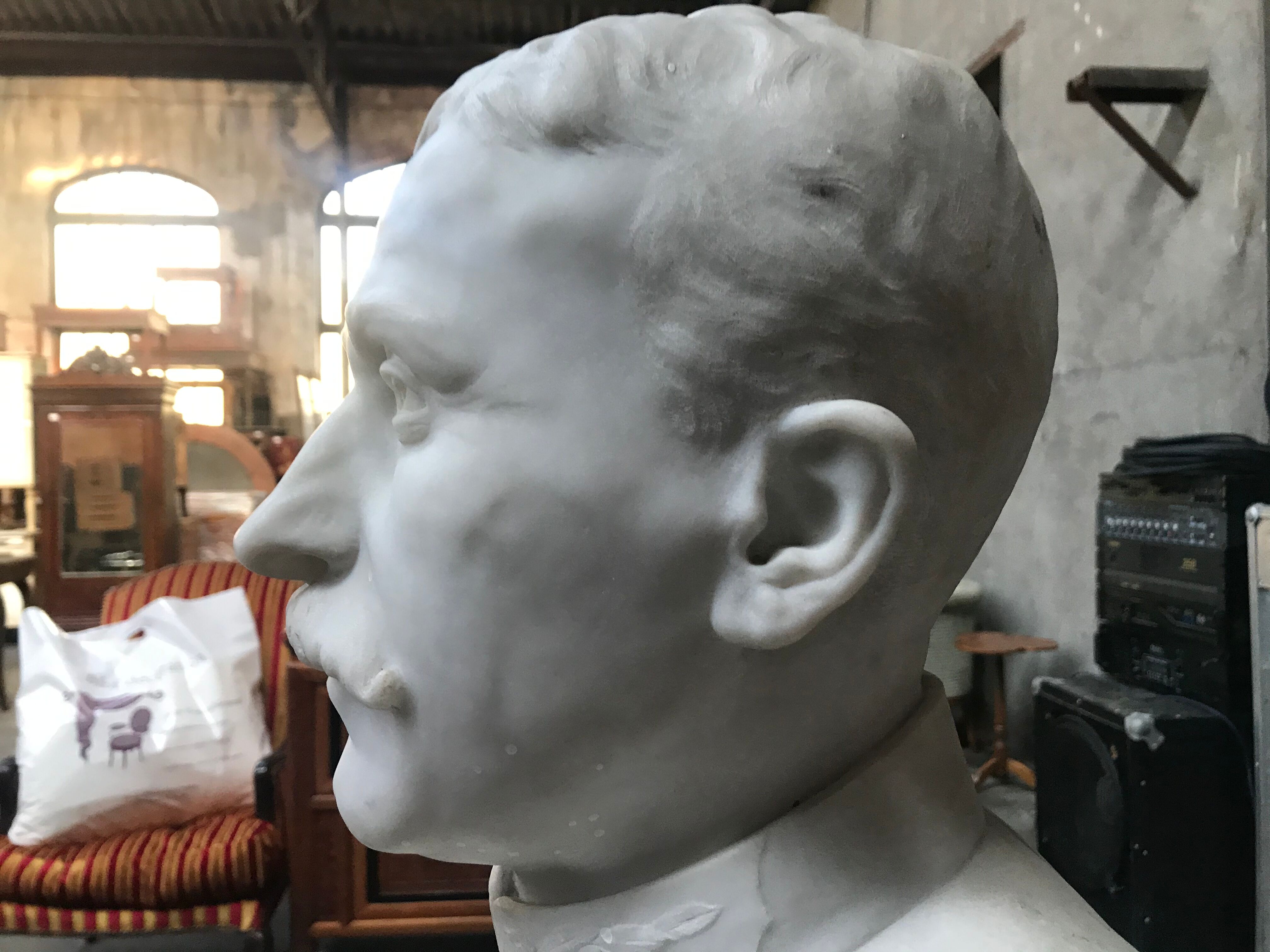 Man bust in square marble signed "F. Dezandes"