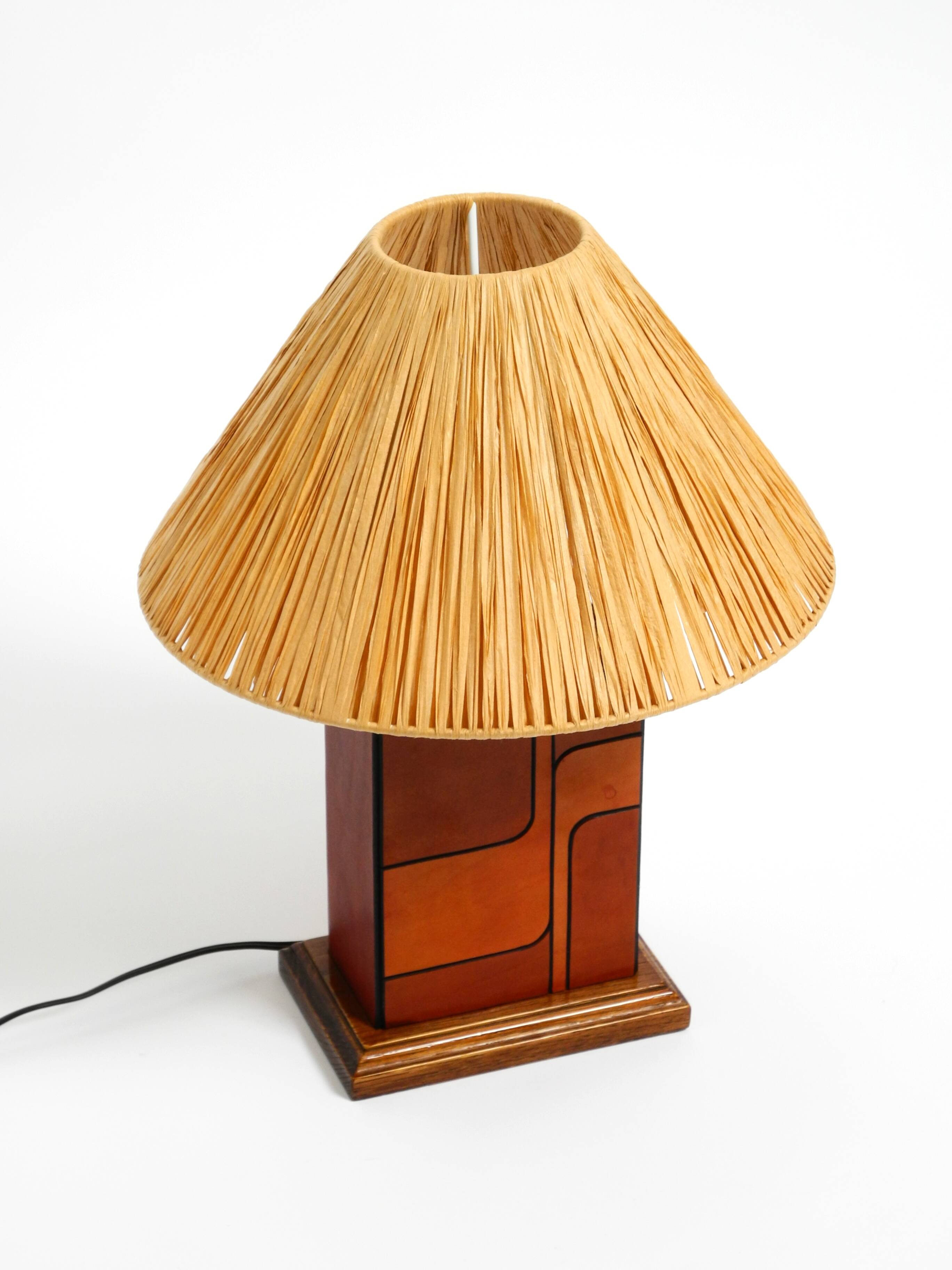 Italian 60s table lamp made of wood and leather with paper straw lampshade