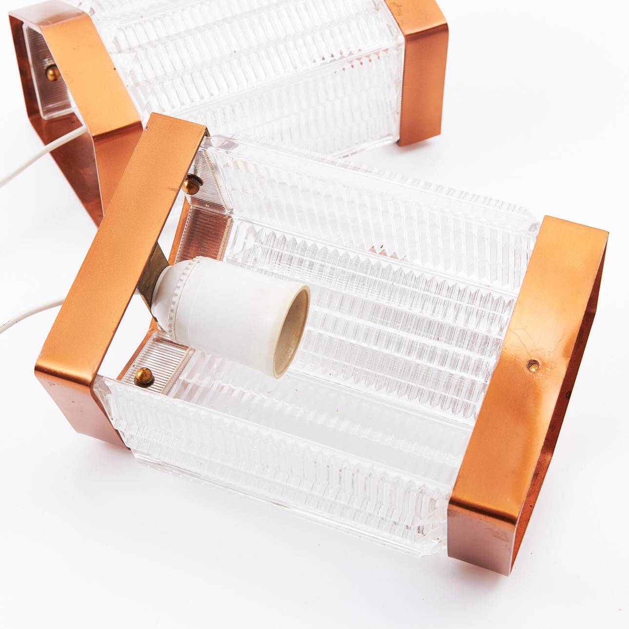 Scandinavian wall lights in copper and pressed glass