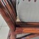 Vintage salon Maison Maugrion in rattan with leather and feather finishes.