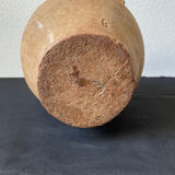 Old candied pot in yellow glazed terracotta