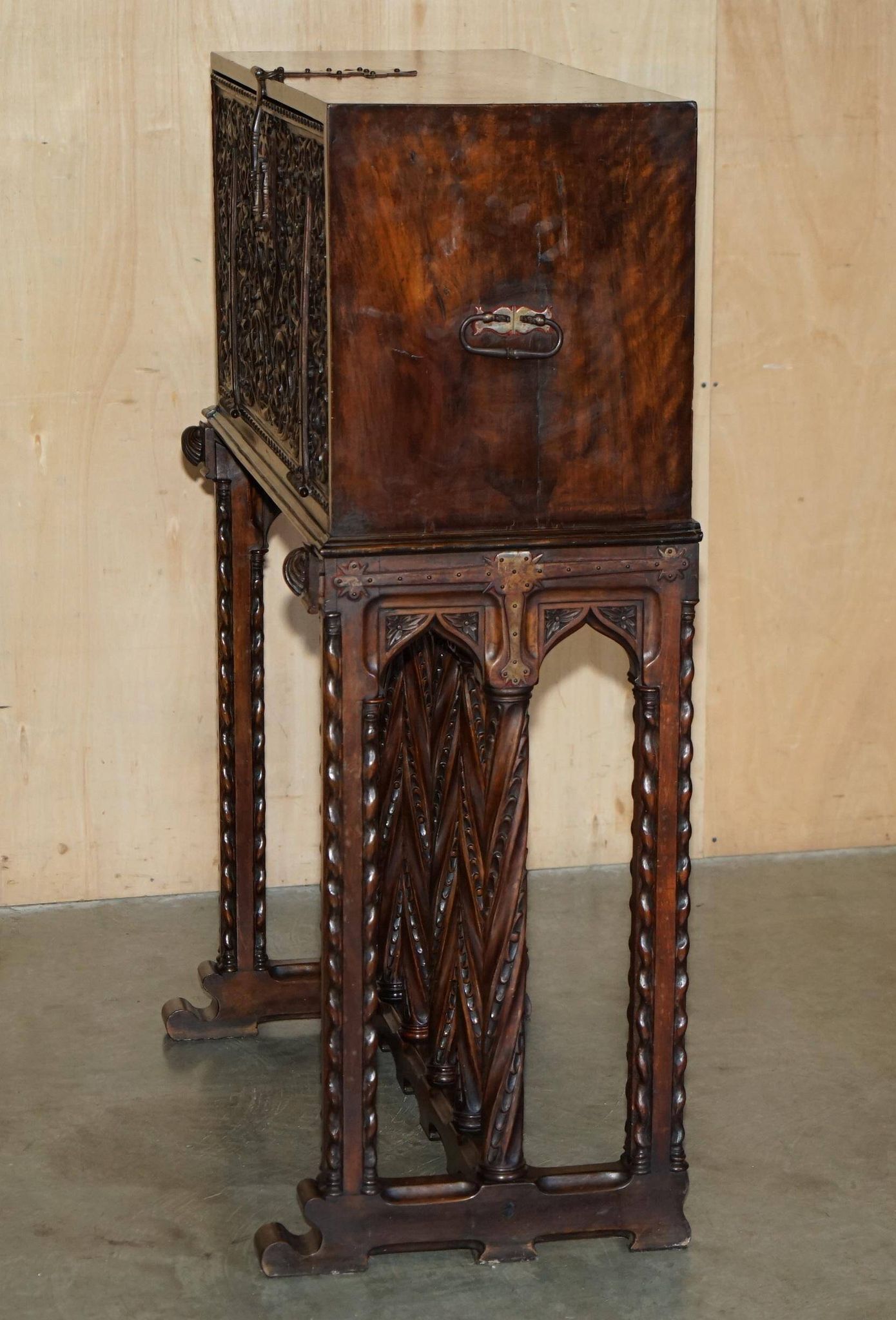18th-century carved Spanish cabinet with hidden storage.