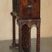 18th-century carved Spanish cabinet with hidden storage.