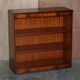 Pair of open low bookshelves Shaws of London in hardwood.