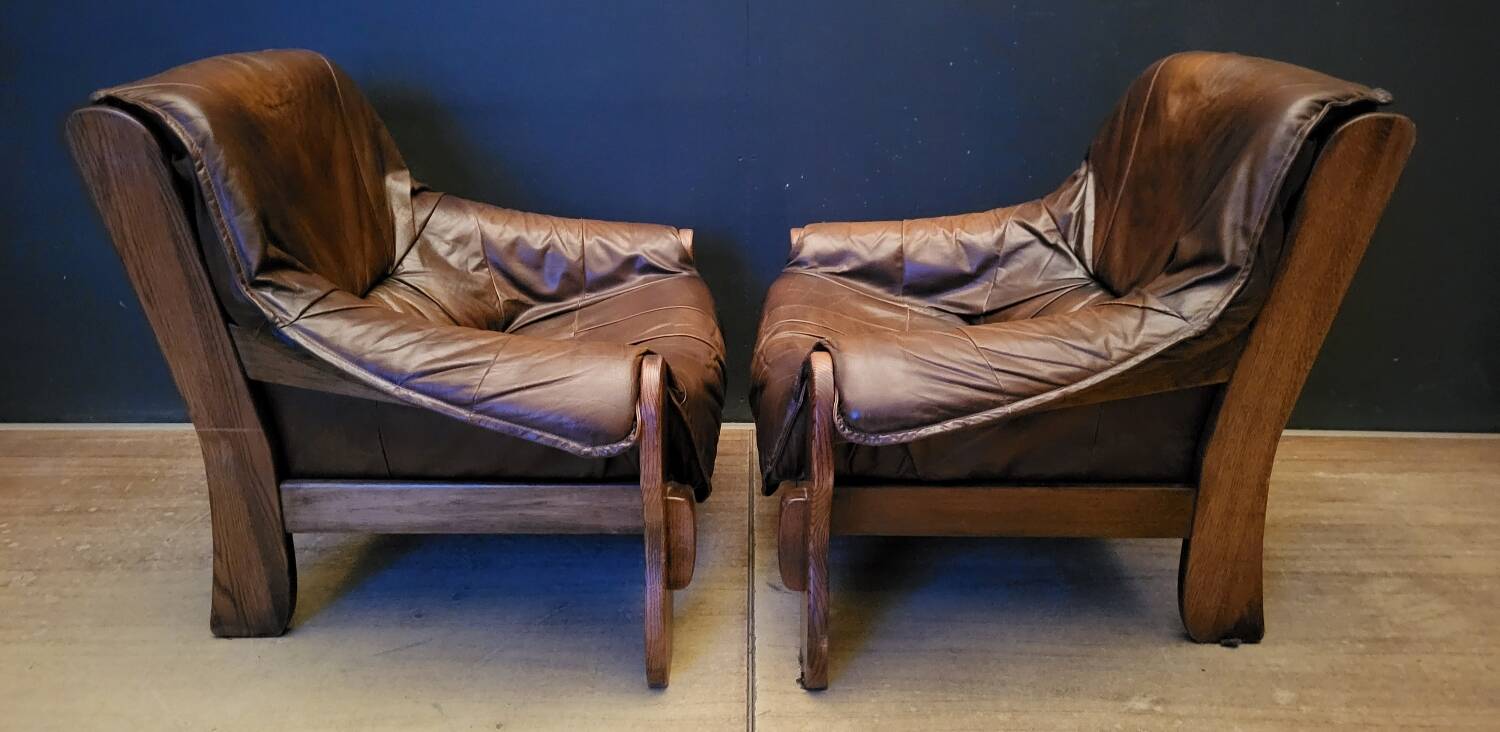 Pair of Vintage Brutalist armchairs from the 60s in leather and solid oak