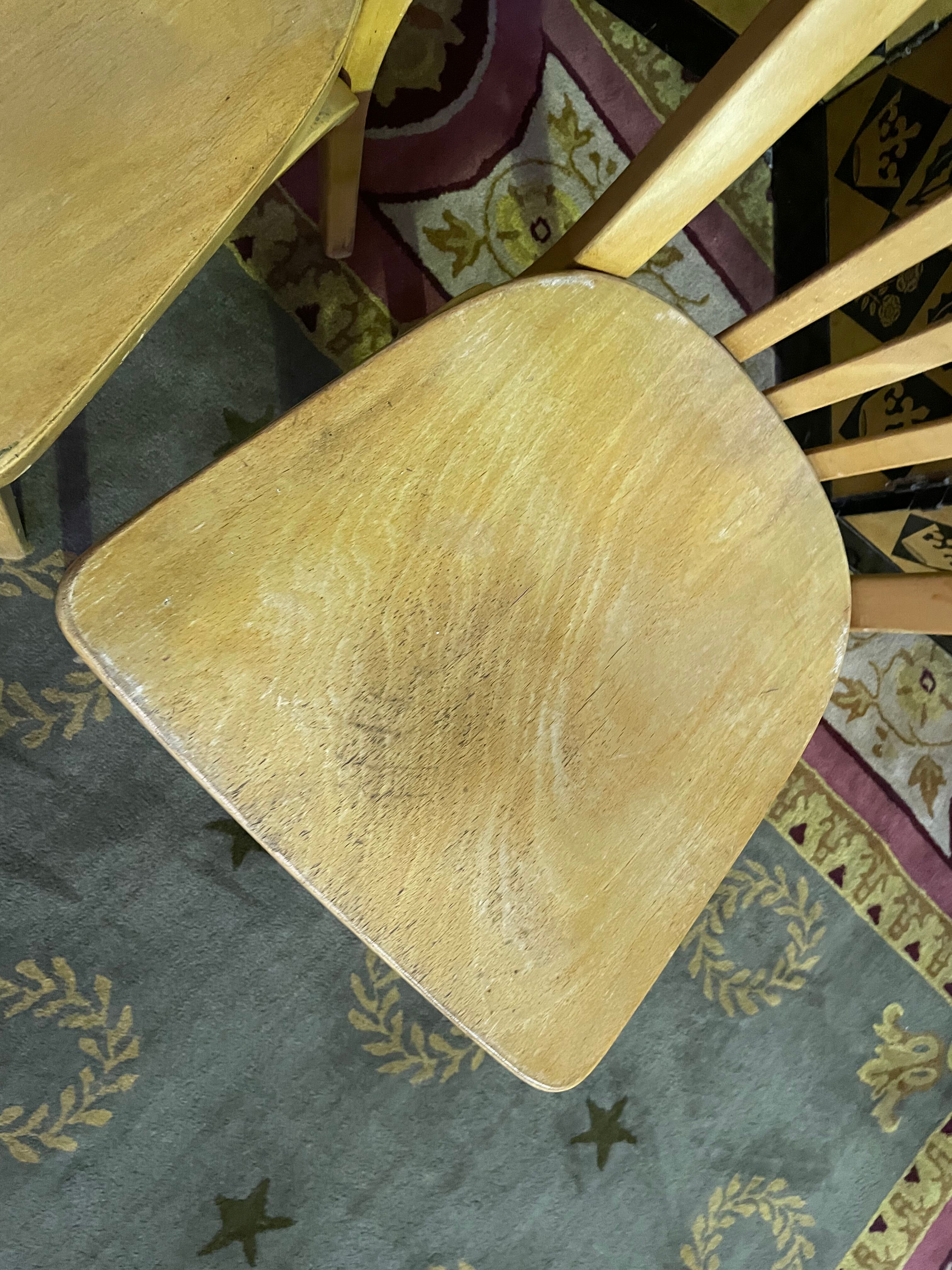 Suite of 6 bistro chairs signed "baumann"