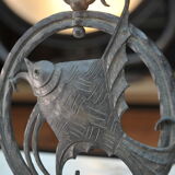 Pair of carved metal wall lamps signed RG