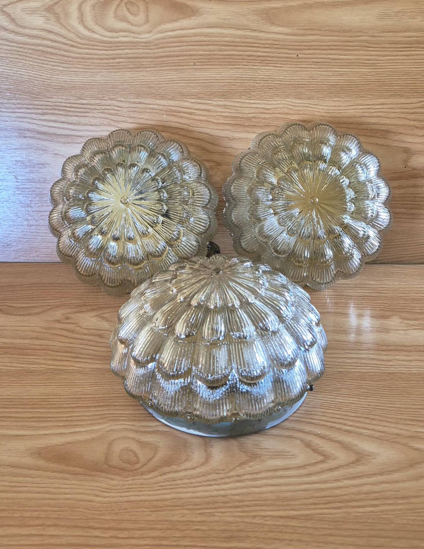 Set of 3 vintage amber moulded glass wall lights and ceiling lights.