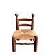 Low brutalist chair in dark wood and straw no. 2