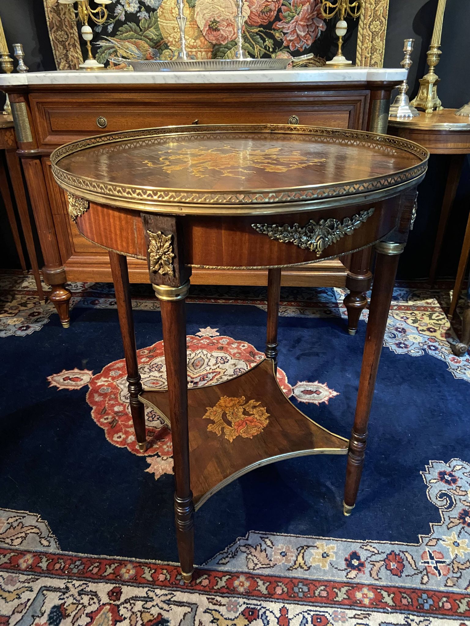 Bouillotte table pedestal table with marquetry decoration and bronze ornaments in the Louis style