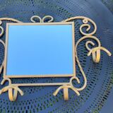 Wall-mounted gilded wrought iron coat rack with mirror