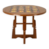 Guillerme and Chambron. Oak and ceramic side table. 1970s-80s.