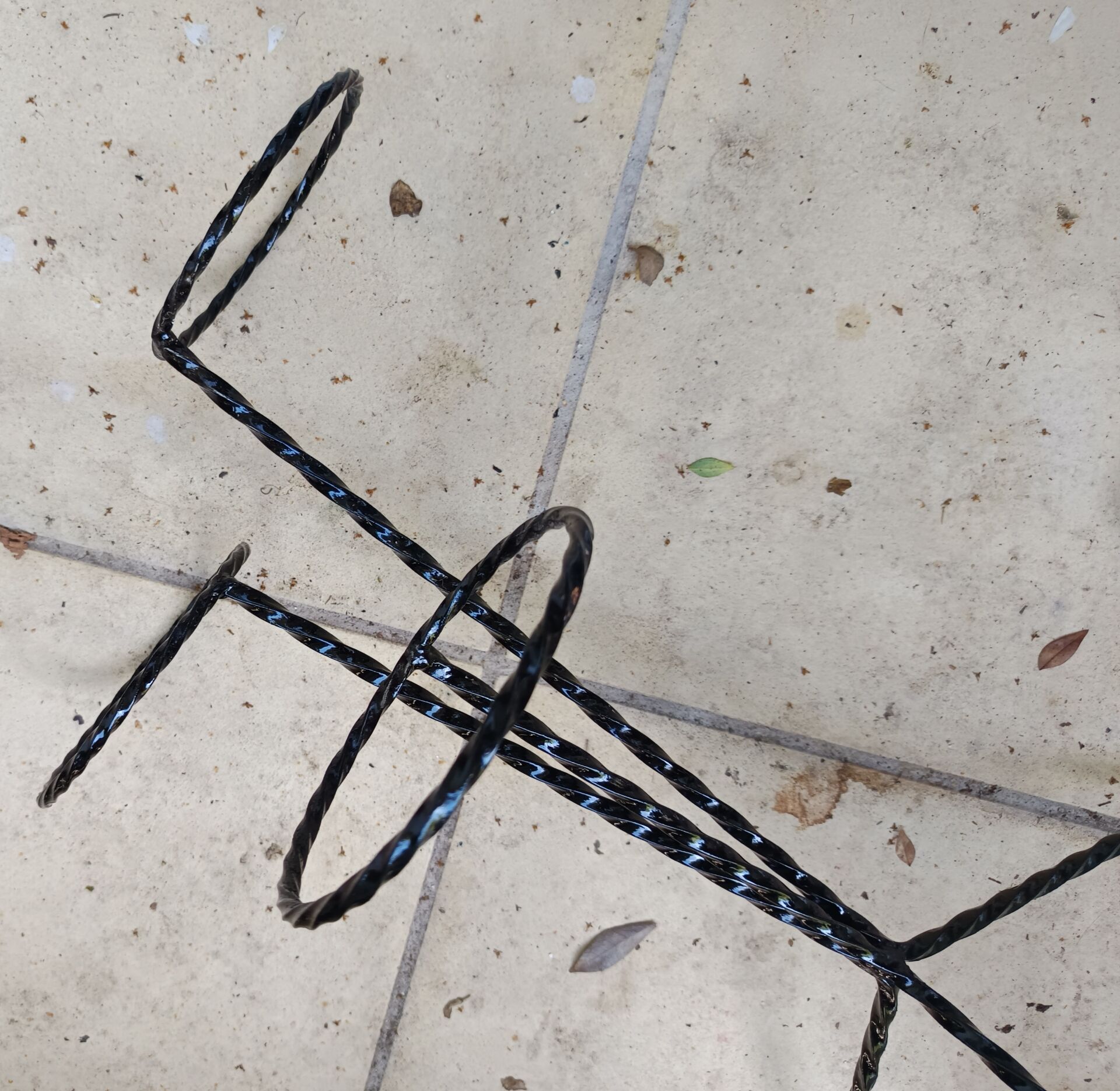 Wrought iron plant stand from the 1950s.