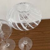 Pair of candle holders in glass paste