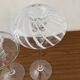 Pair of candle holders in glass paste
