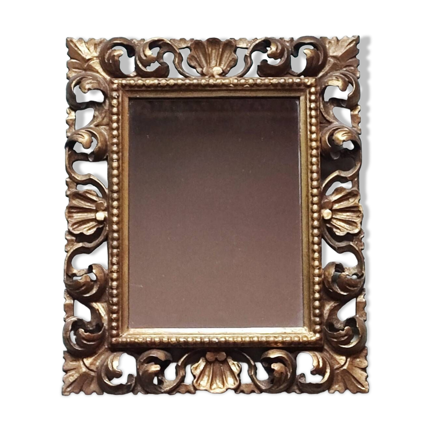 Miroir en bois sculpté et doré