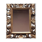 Miroir en bois sculpté et doré