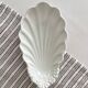 Ravier shell-shaped ramekin in antique porcelain