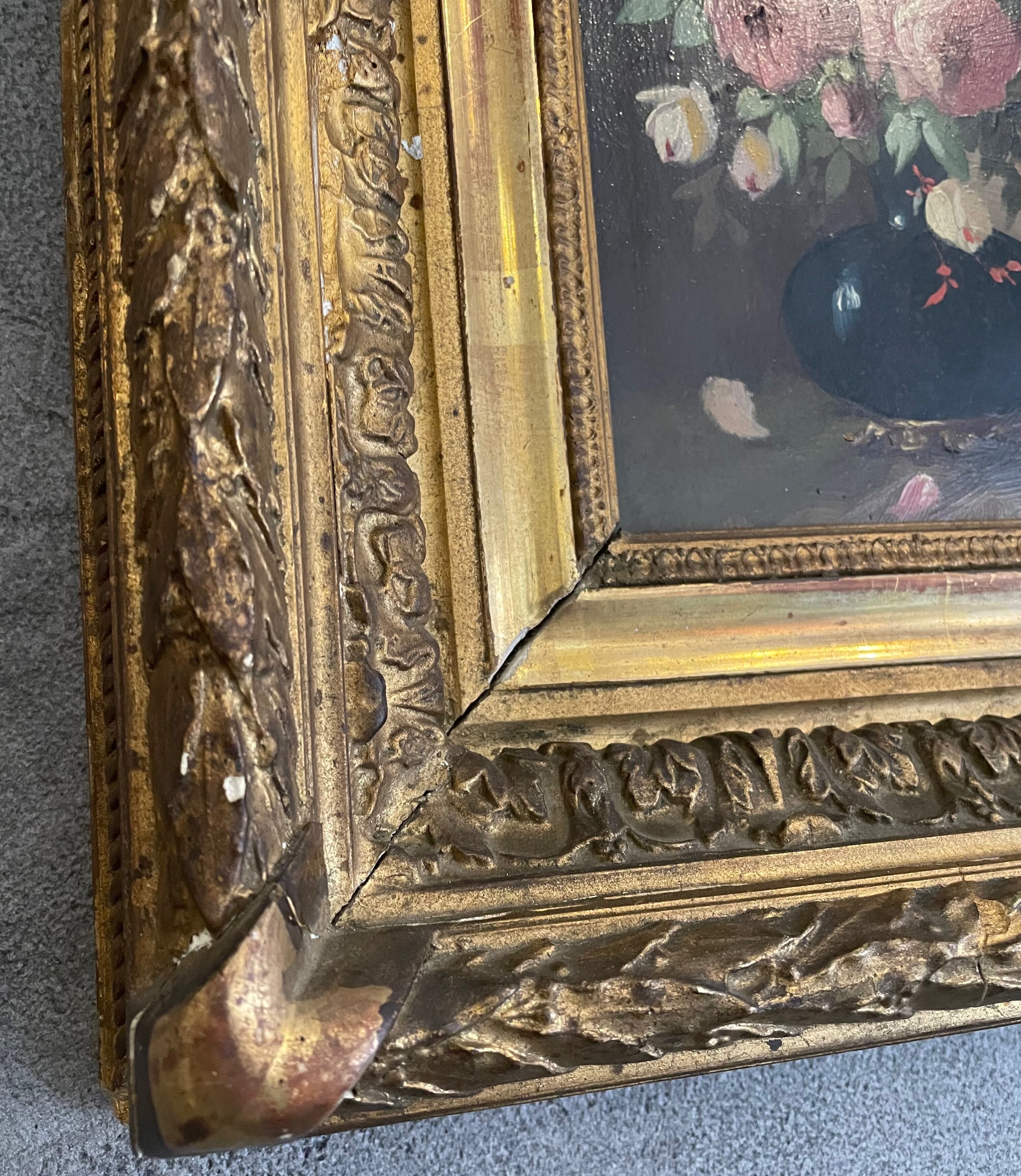 Golden framed flower bouquet painting