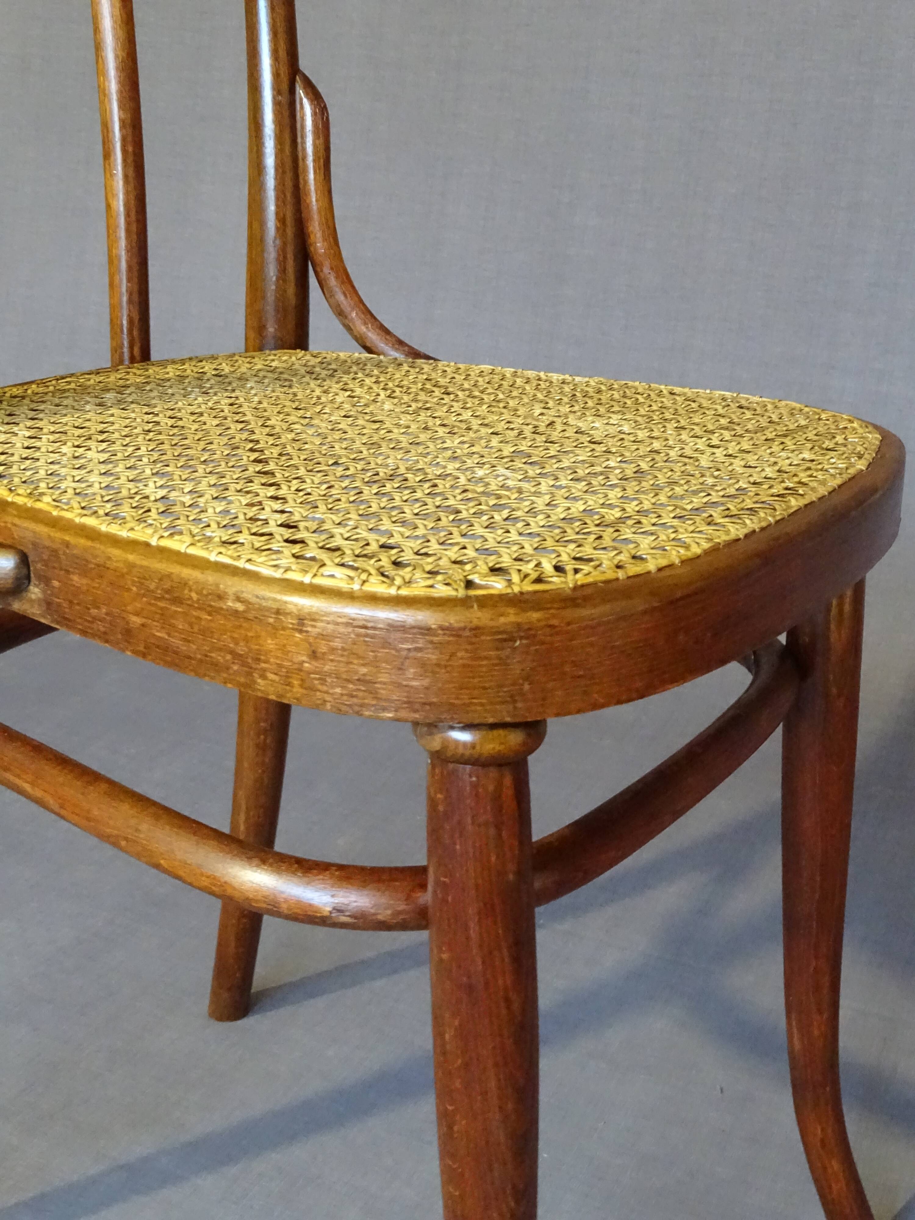 Fake pair of Kohn and Turpe tanned bistro chairs, circa 1900,