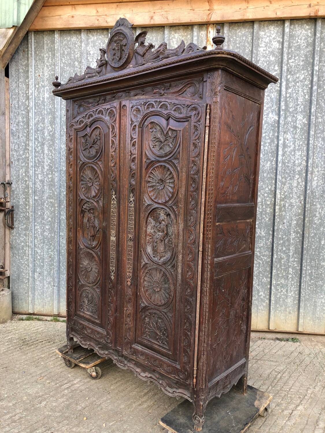 Antique Breton oak cabinet, richly carved