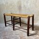 Rustic wood and straw bench