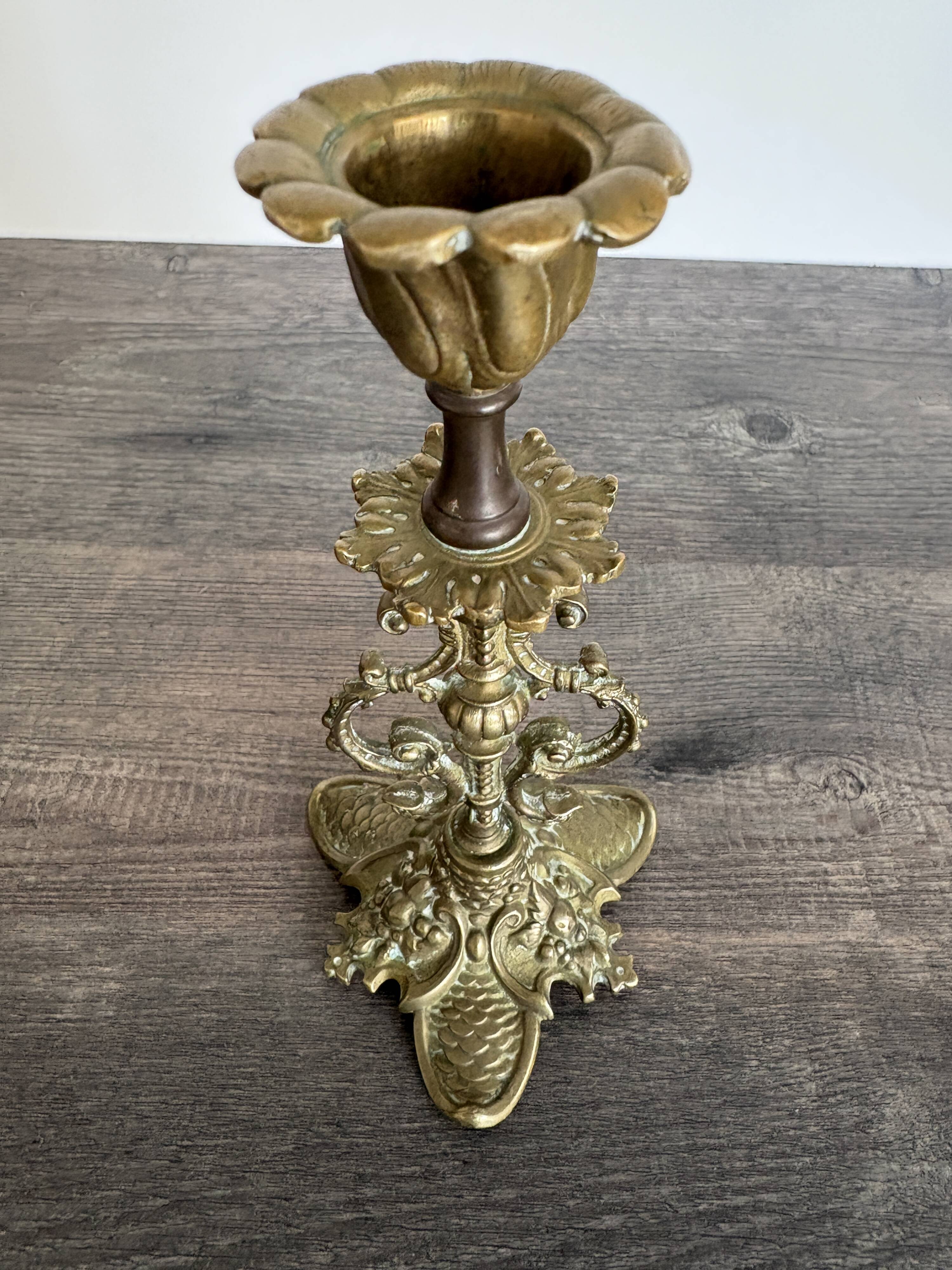 Antique chiselled bronze candlestick