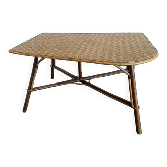 Large free-form rattan table