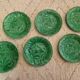 8 green barbotine plates from the early 20th century.