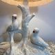 Ceramic lamp with birds, pink fringed shade, 1950s.