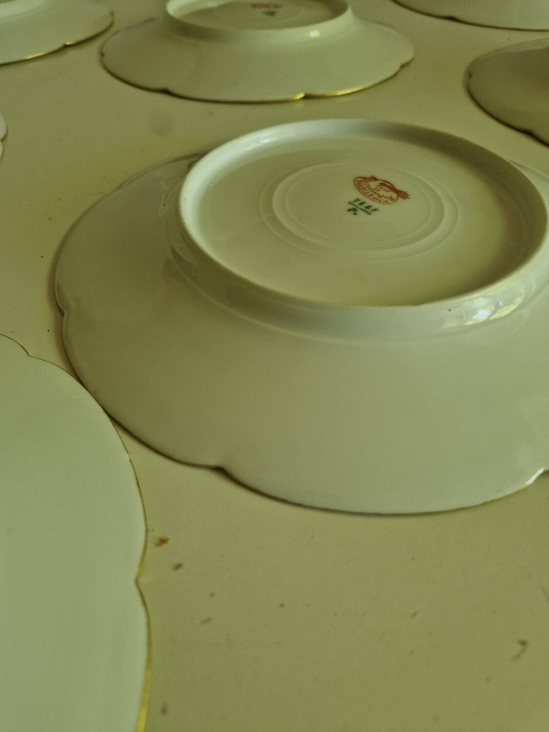 Lot of 11 Porcelain Dinner Plates Plus Presentation Dish Manufactured