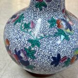 CHINA Polychrome porcelain vase decorated with butterflies Signed under the base 43cm