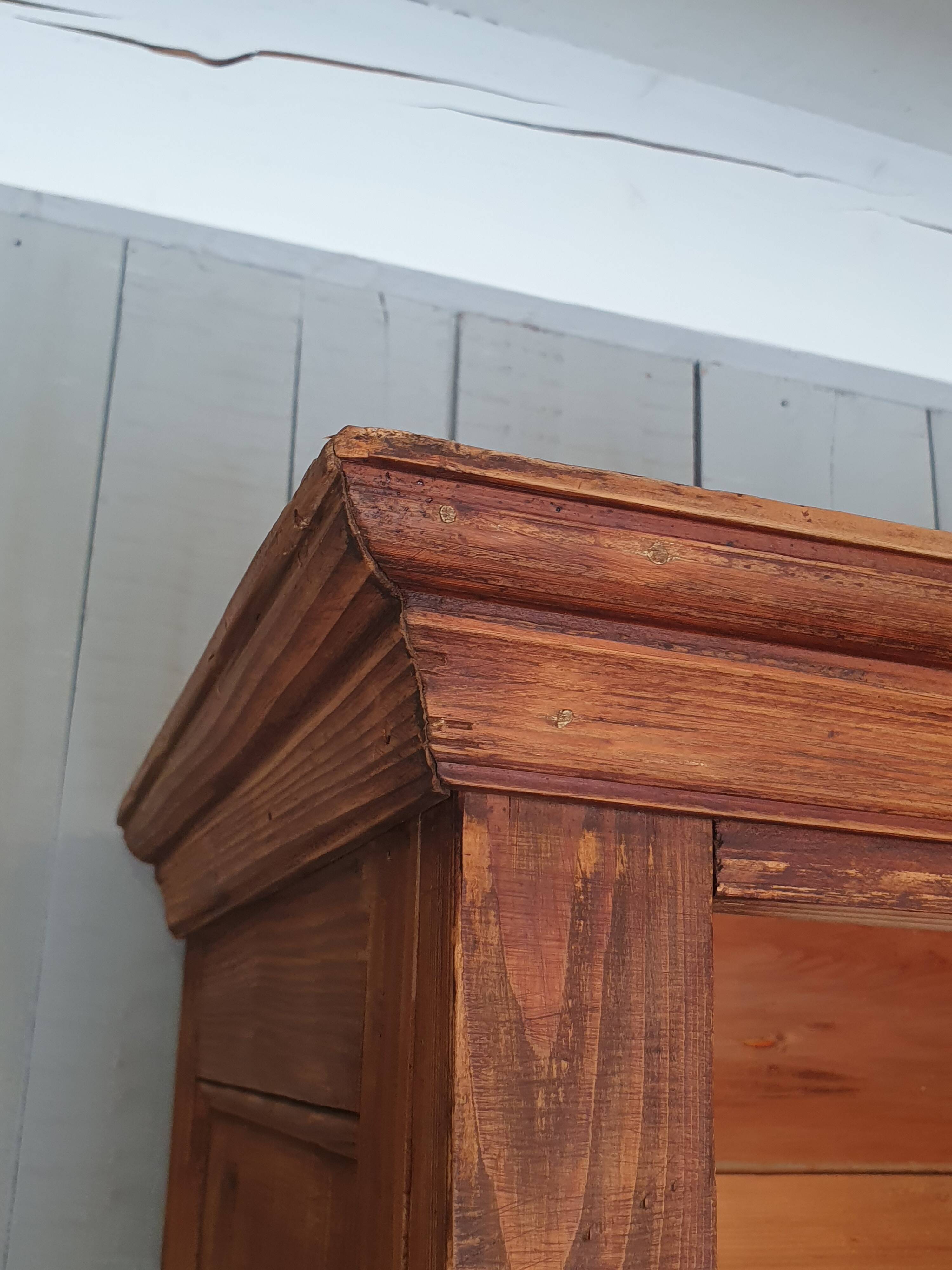 Parisian wardrobe in raw wood