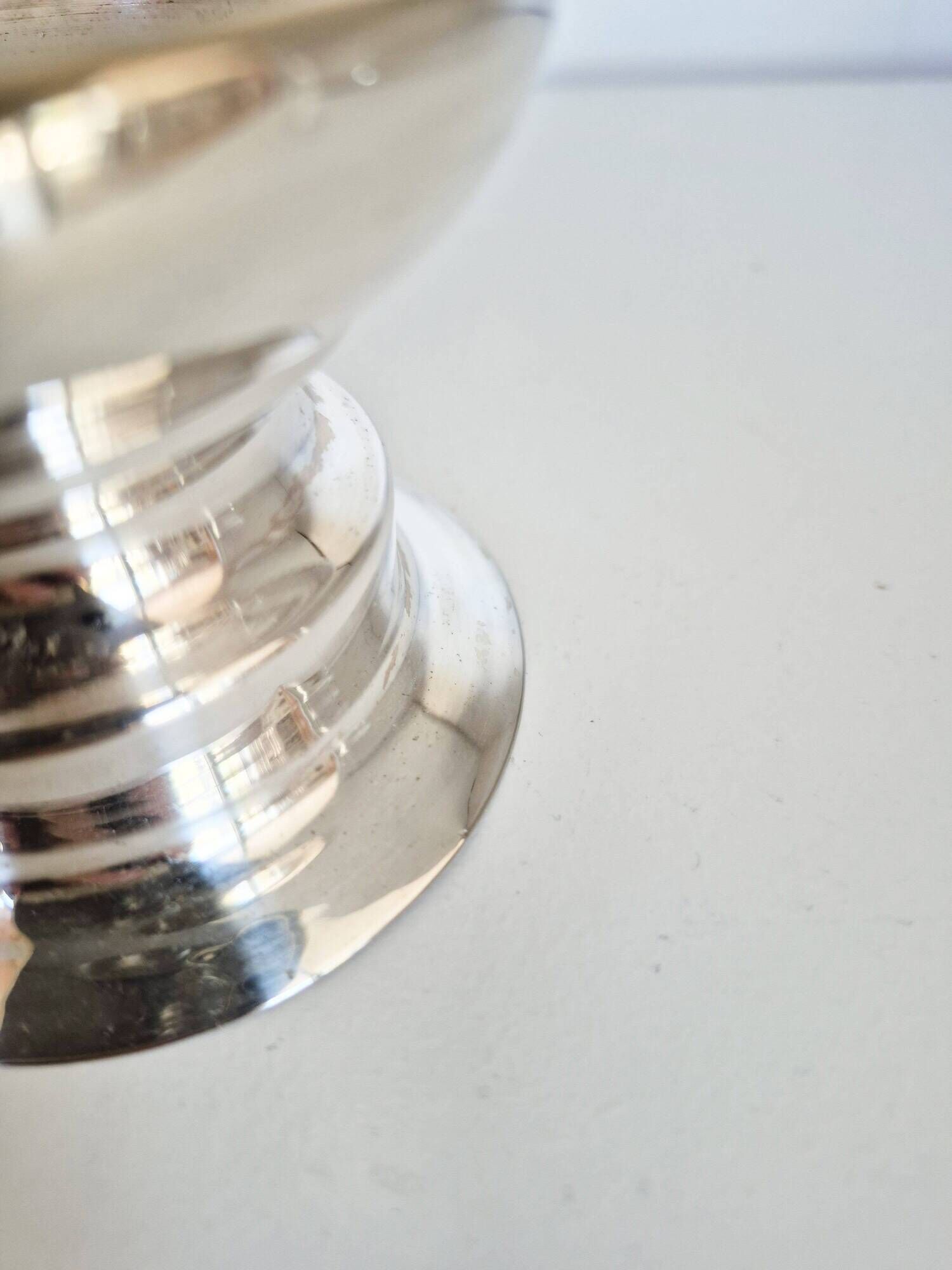 Antique silver candle holder.