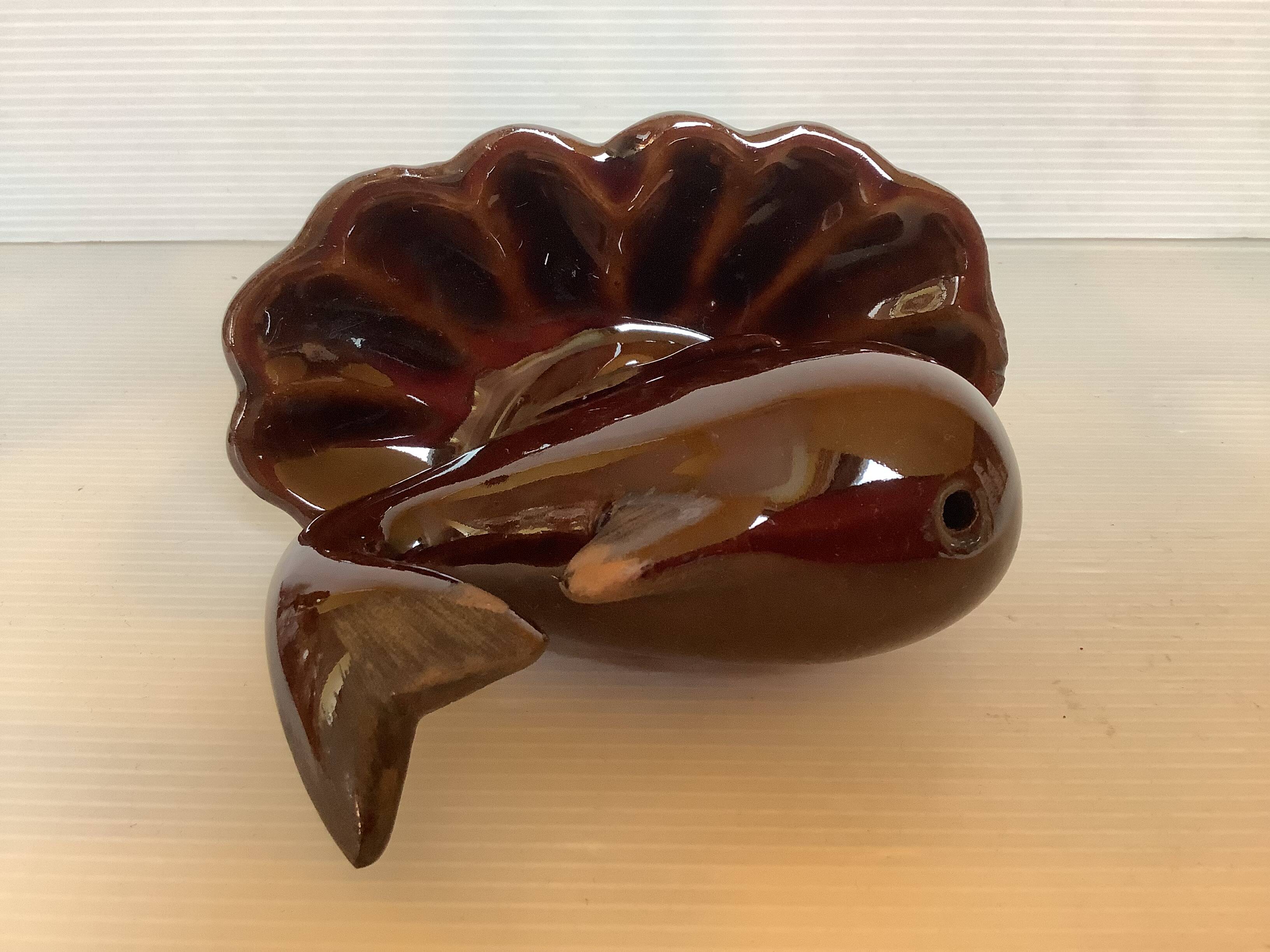 Whale-shaped pocket ashtray