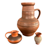 Trio of vintage vases in chiselled terracotta
