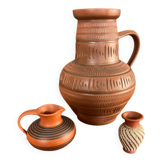 Trio of vintage vases in chiselled terracotta