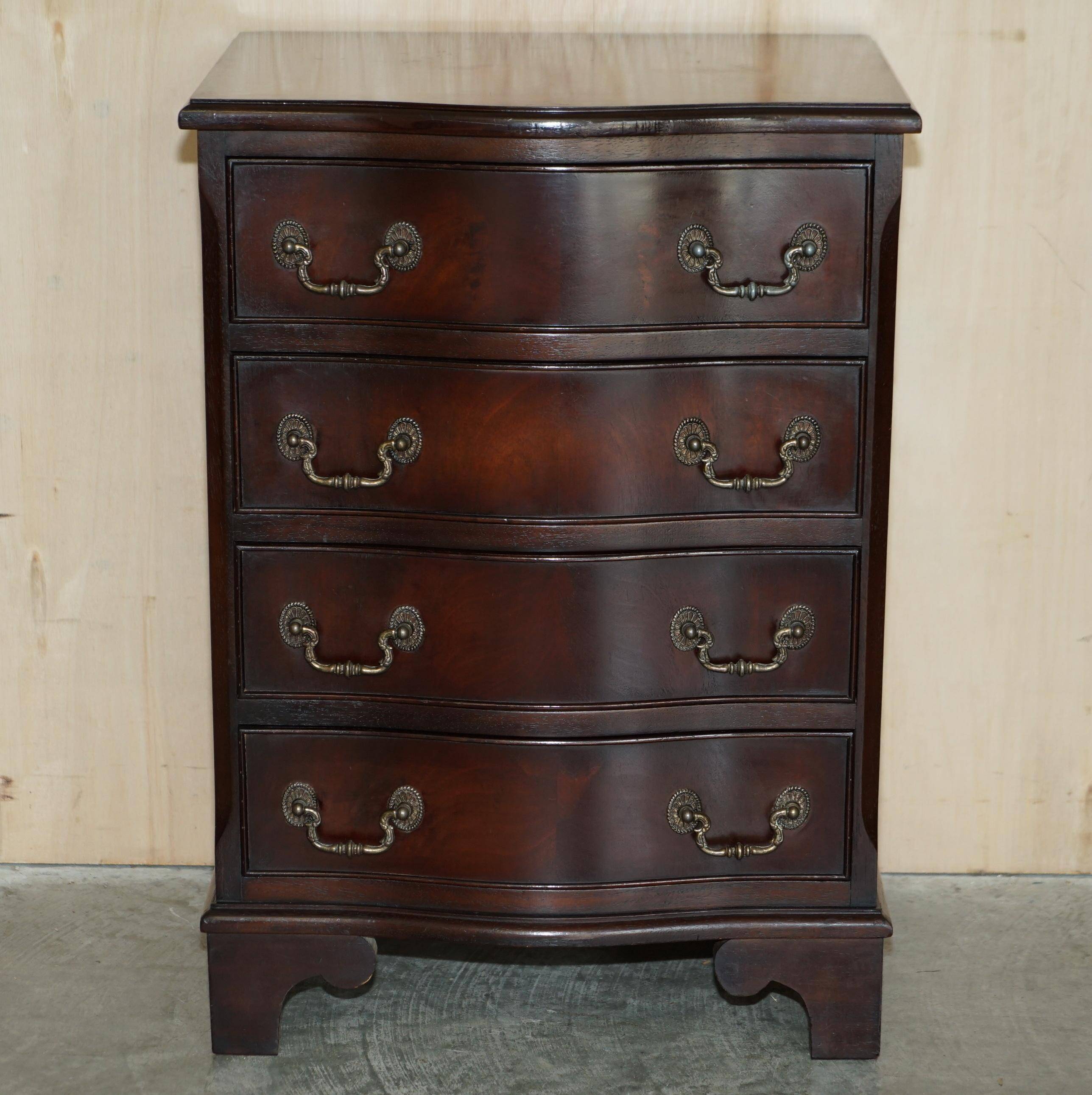 Vintage serpentine front hardwood chest of drawers