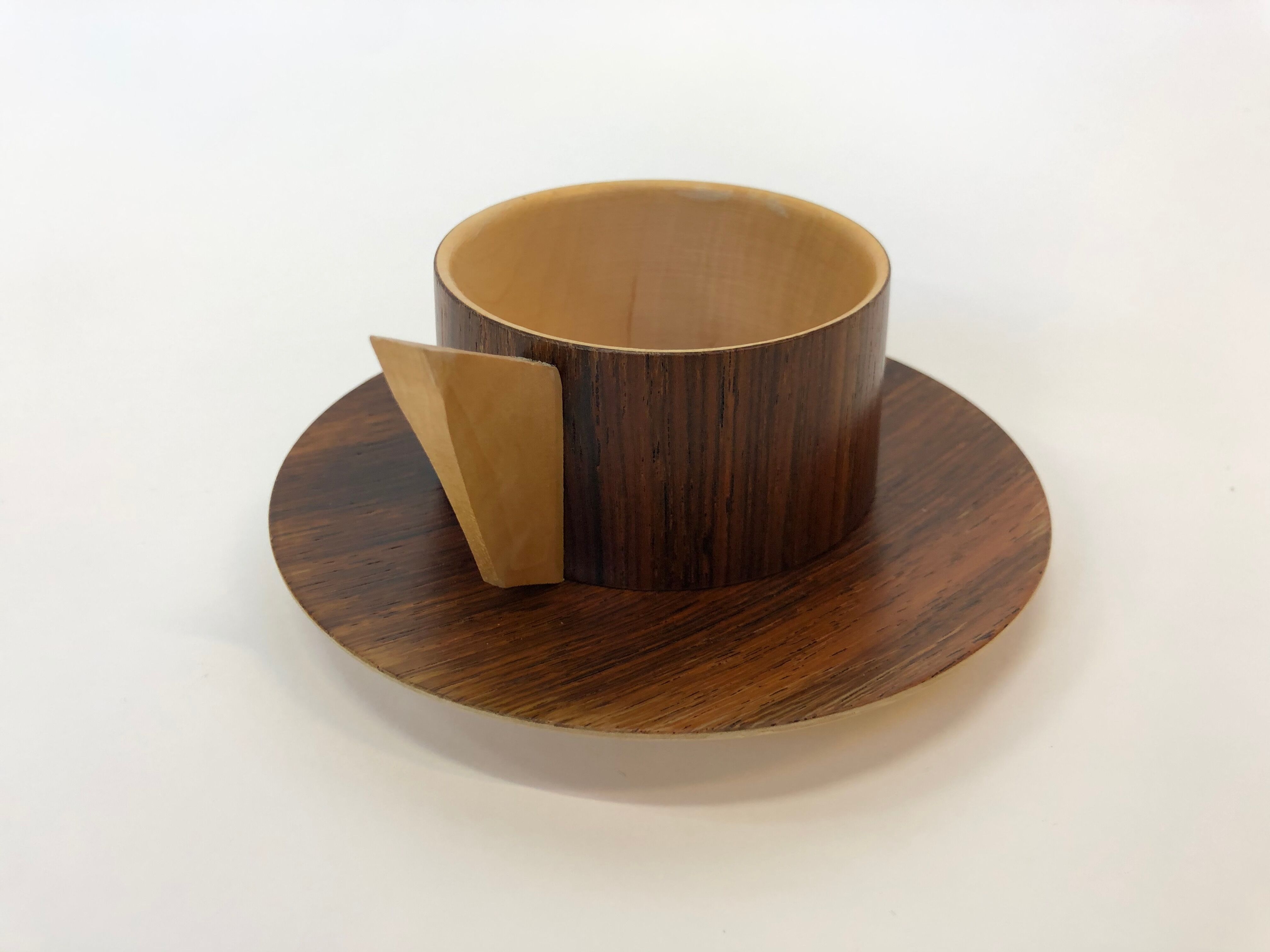 Vintage wooden cups and saucers in teak