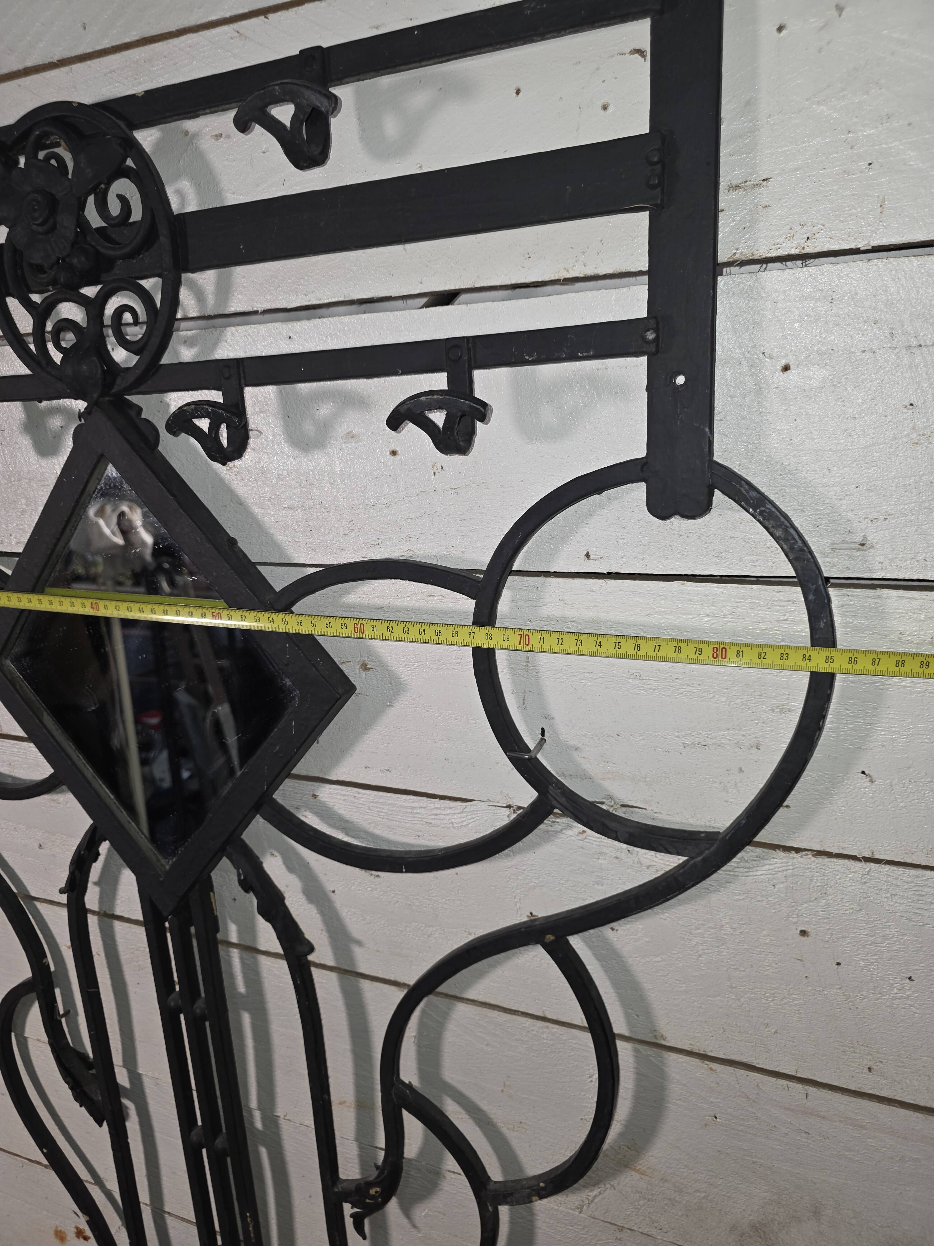 Art Deco coat rack wardrobe in wrought iron from the 1930s.