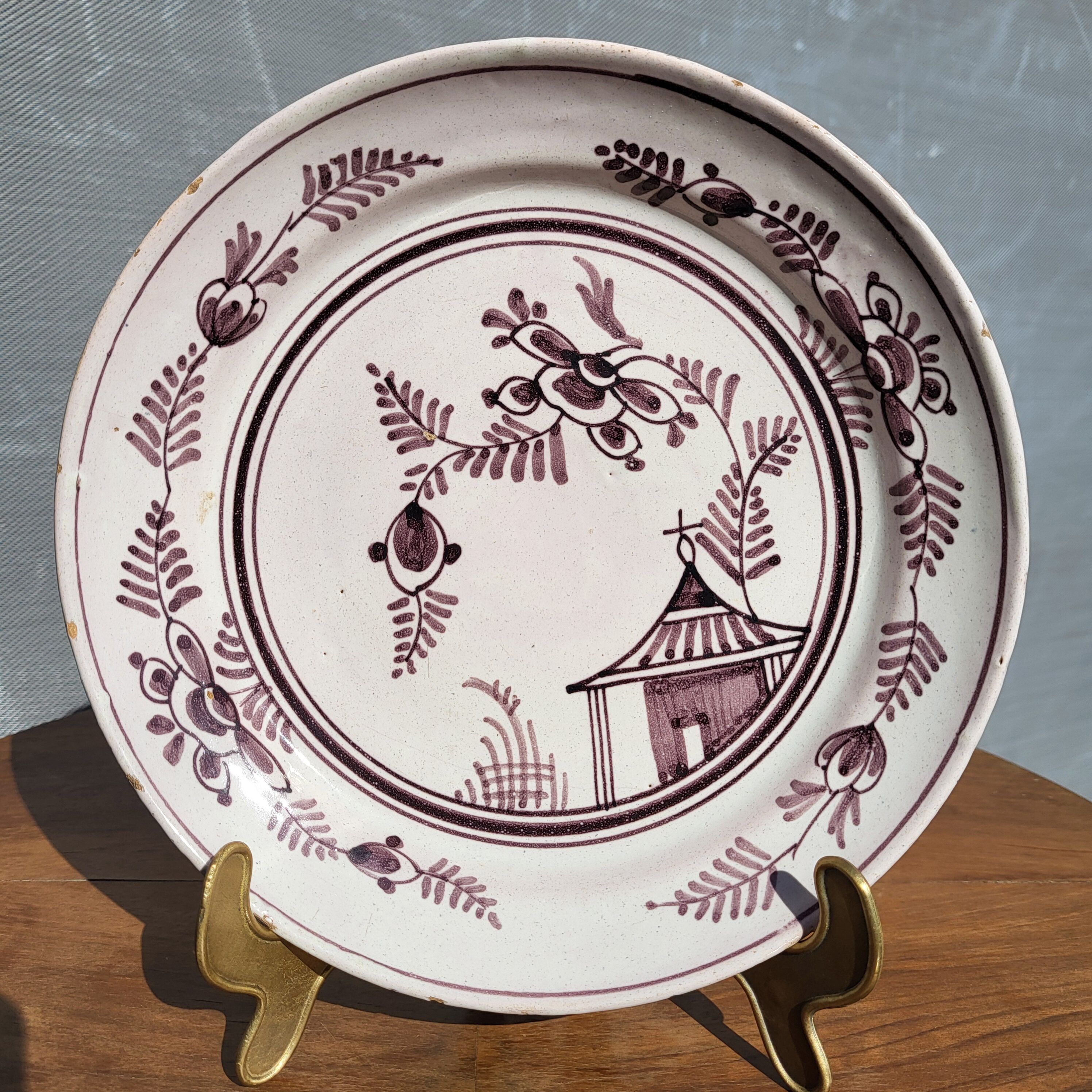 Grand Feu earthenware plate, Manganese decoration - 18th century